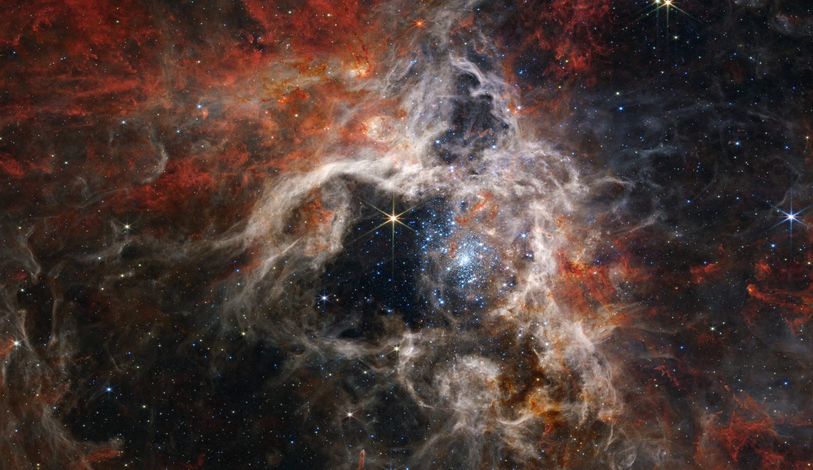 La Nebulosa de la Tarántula ofrece una visión de los misterios de un mediodía cósmico hace mucho tiempo