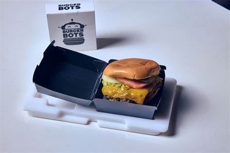 27 másodperc alatt pakolják össze a hamburgert a robotburgerezőben